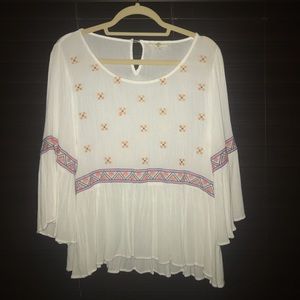 Quarter length flowy patterned shirt